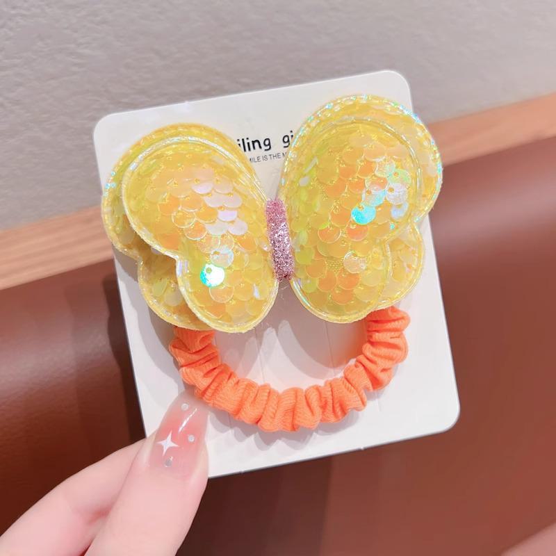 Детская резинка для волос с пайетками в виде бабочки не повредит волосы. Идеально подходит для высоких хвостов или в качестве головного убора для девочек.