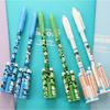 10pcs 0.5mm Creative Rocket Missile Shaped Neutral Pen Signature Pen Weapon Pen Stationery Black Pen Rocket Pen