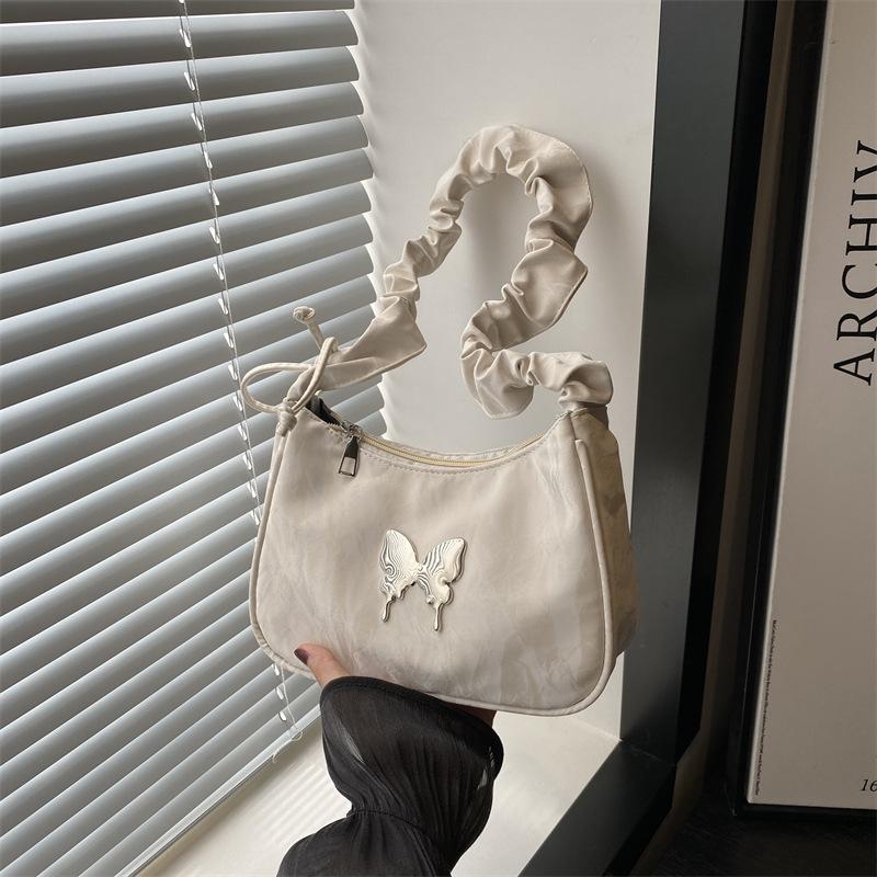 Сумка подмышкой женская 2024 новый трендовый иностранный стиль личность мода повседневная сумка через плечо в этом году популярная красивая сумка в форме полумесяца