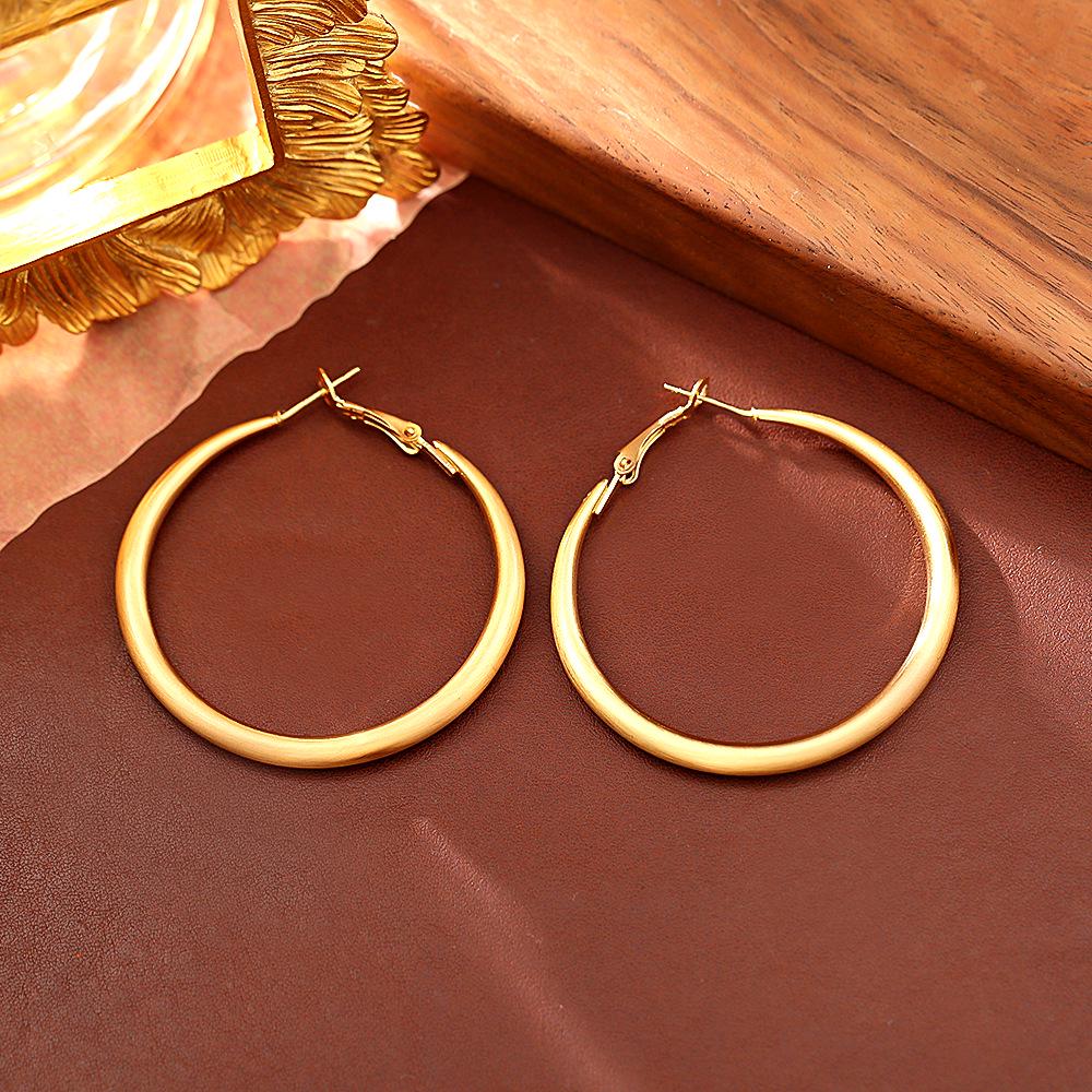 Trendy European & American Matte Gold Earrings: Sleek, Fashionable, High-End Style with a Modern Edge