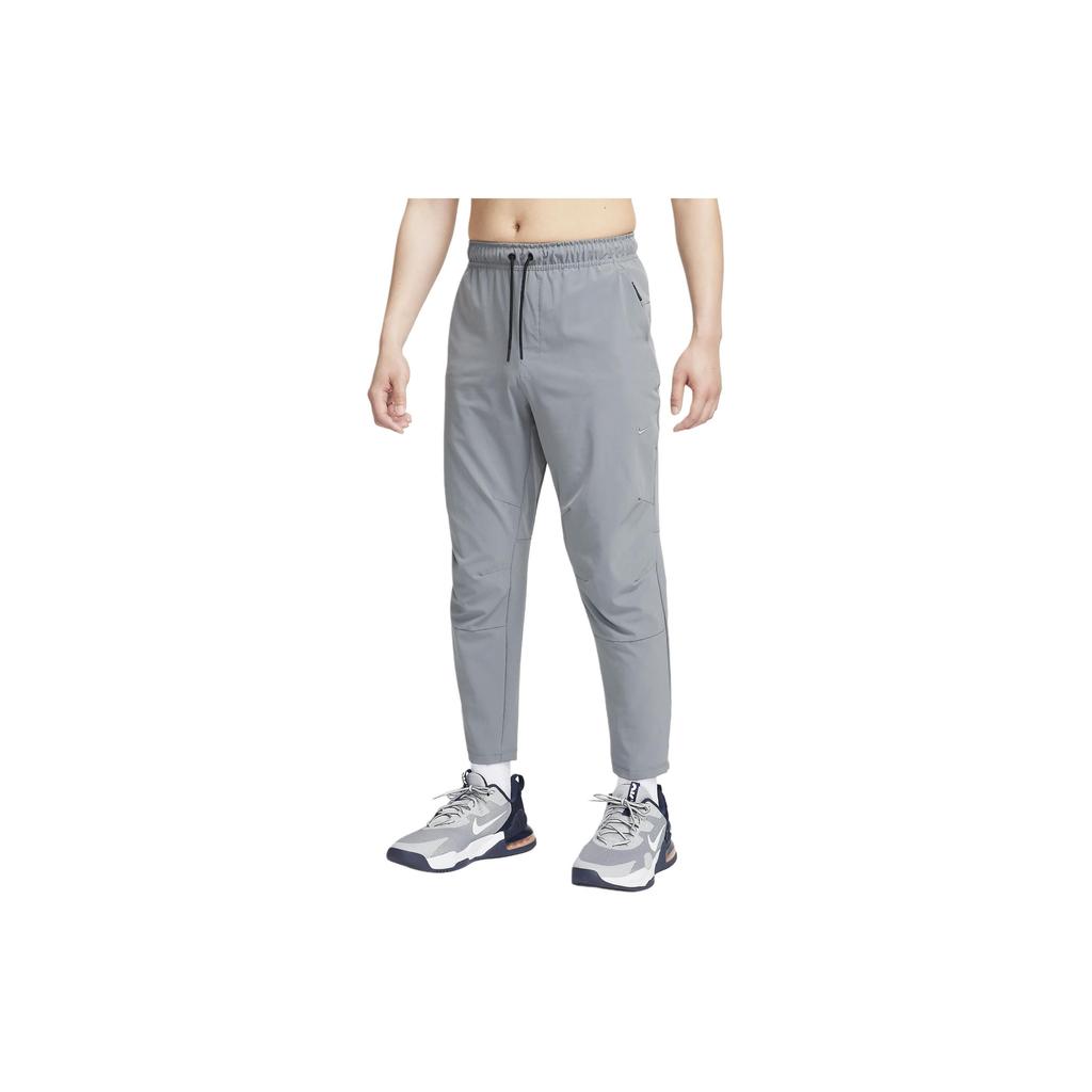 Nike Повседневные брюки Dri Fit Unlimited для мужчин, дымчато-серые FB7547-084