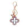 Exquisite Four-Leaf Clover Alloy Keychain Charm - Perfect Gift for Girlfriend, Bag Accent, or Keyring Accessory.