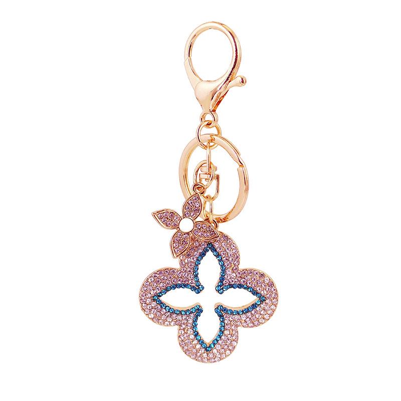 Exquisite Four-Leaf Clover Alloy Keychain Charm - Perfect Gift for Girlfriend, Bag Accent, or Keyring Accessory.