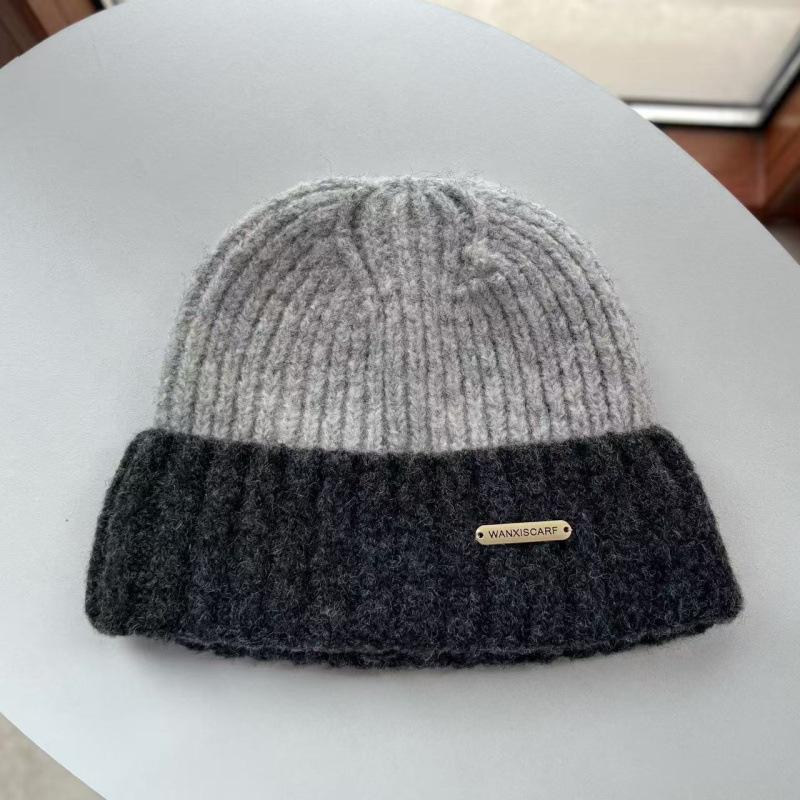 Hat women's autumn and winter new wool knitted hat thickened warm color matching couple student fashion wool hat tide