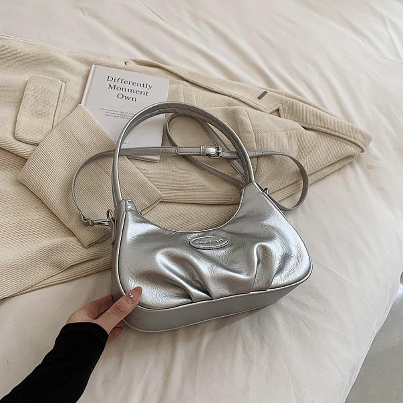 Корейская версия подмышечная сумка складная искусственная кожа однотонная женская сумка нишевый дизайн чувственная текстура одно плечо сумка простая новая