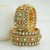 Kundan With Oval And Choki Shape Gold Plated Copper Bangle
