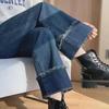 Women's Retro High-Waist Denim Pants - Fashionable Loose Fit with Contrast Rolled Hem. Perfect for Spring and Autumn.
