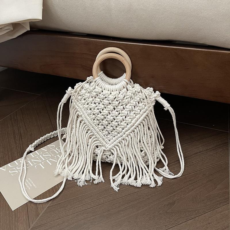 Bohemian fringed portable small bag women's 2025 new spring and summer hollow shoulder woven bag crossbody straw bag