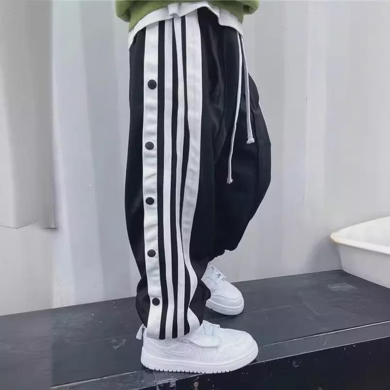 Трендовые спортивные брюки на пуговицах для мальчиков - коллекция осень 2023 г., свободный крой, стильные для детей