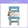 Dog Resin Ornament Lies On The Stool With Rustic Style For Home Decoration