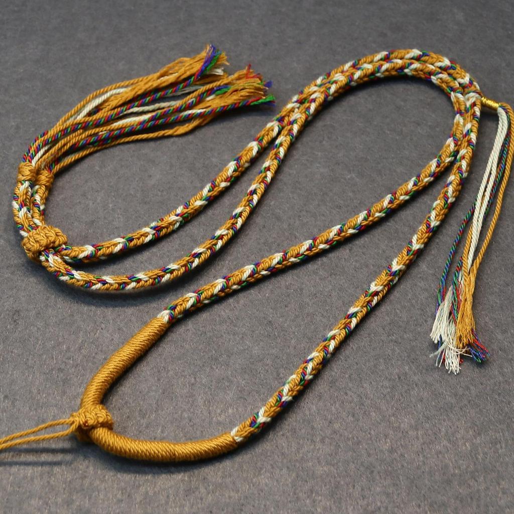 Тибетское ожерелье ручной работы «Пять богов богатства» - Плетеный шнурок-подвеска, вдохновленный традиционными культурными украшениями и дизайнами танки