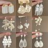 Fashionable White Flower Shell Earrings with Temperament, New Earrings, European and American Fashion High-end Earrings