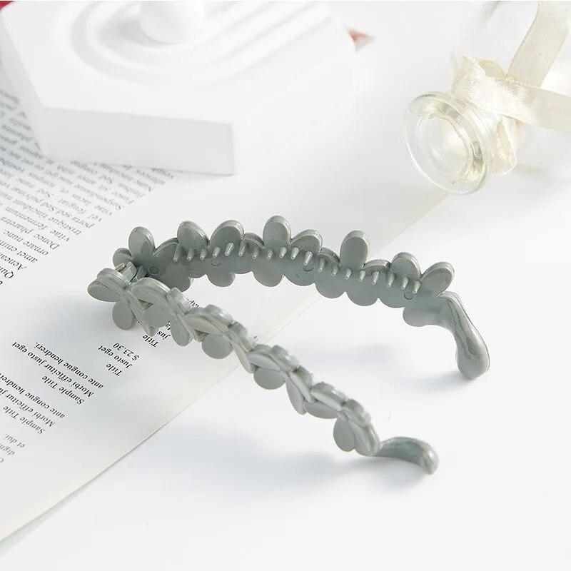 Korean Simple Frosted Banana Ponytail Hair Clips Small Flowers Ponytail Holder Back Head Banana Clip Plum Blossom Twisted Clip