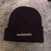 Б/у черная вязаная шапка BALENCIAGA