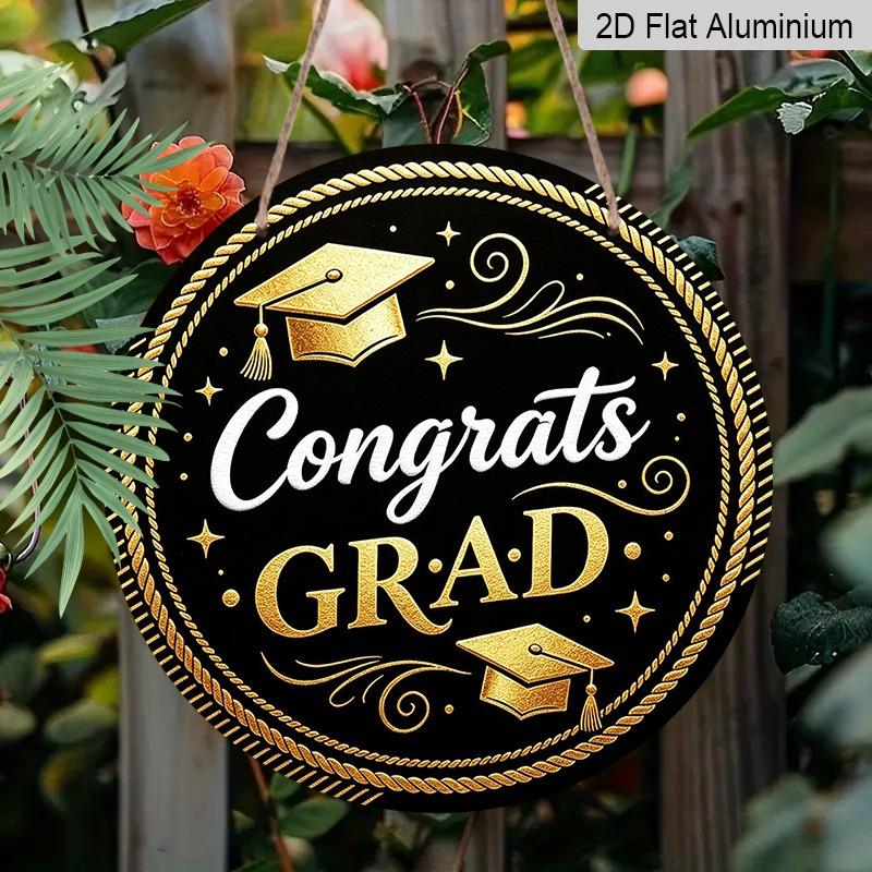 2D Flat Aluminum Graduation-themed Wall Decoration Available in Multiple Sizes Features A Black and Gold Minimalist Graduation Cap Design Making It A