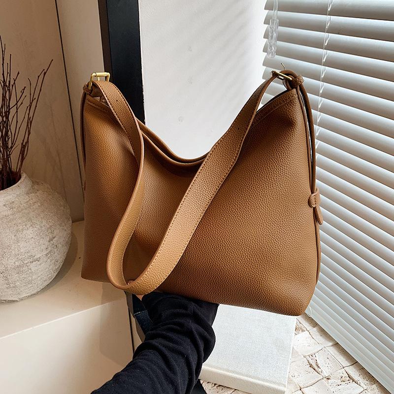 Премиальная сумка для поездок на работу женская 2024 новая повседневная универсальная сумка через плечо подмышкой простая темпераментная сумка-ведро