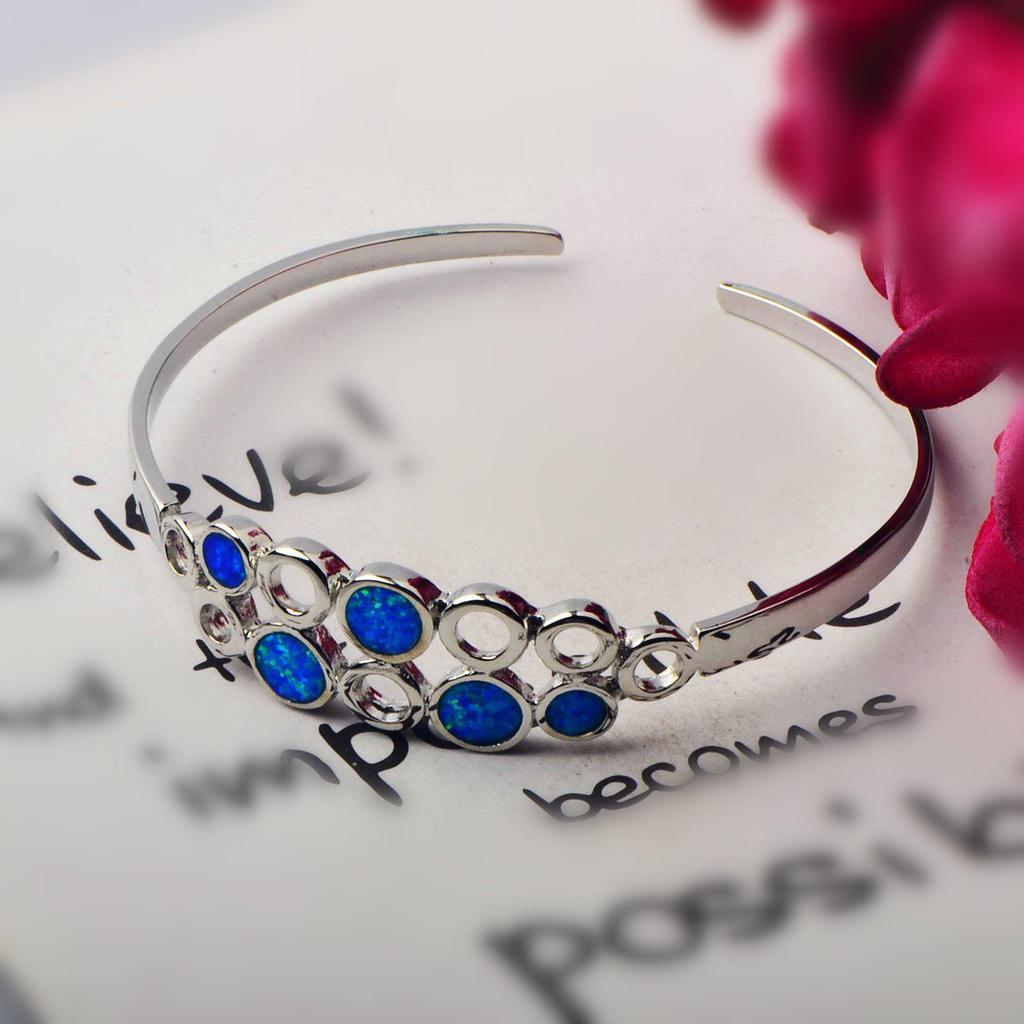 Браслет-манжета в гавайском стиле с инкрустацией опалом, ювелирное изделие