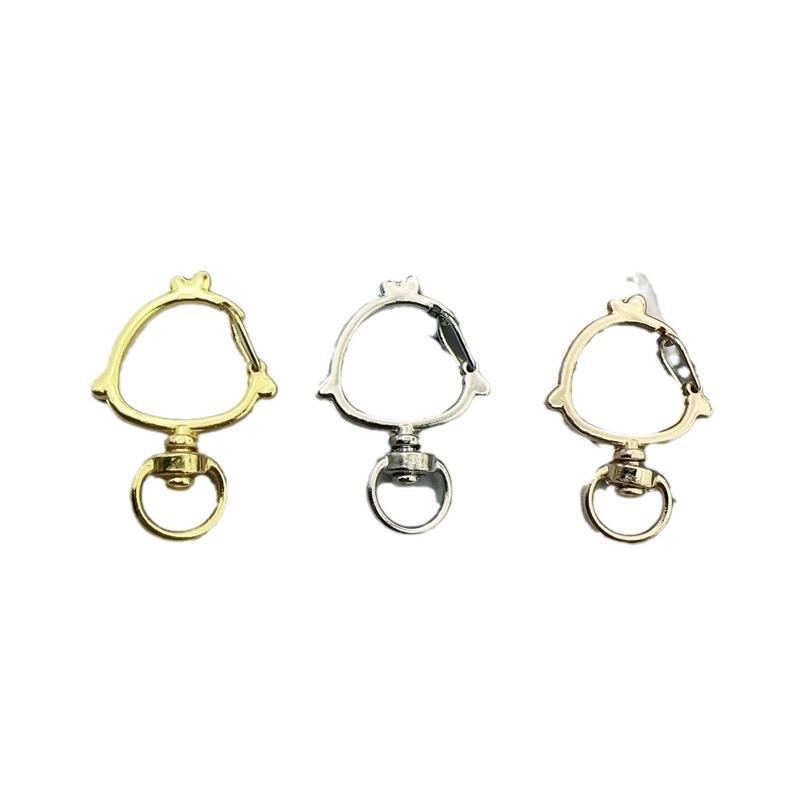 Handmade Metal Rotating Chick Keychain with Christmas Bell and Color Retention.