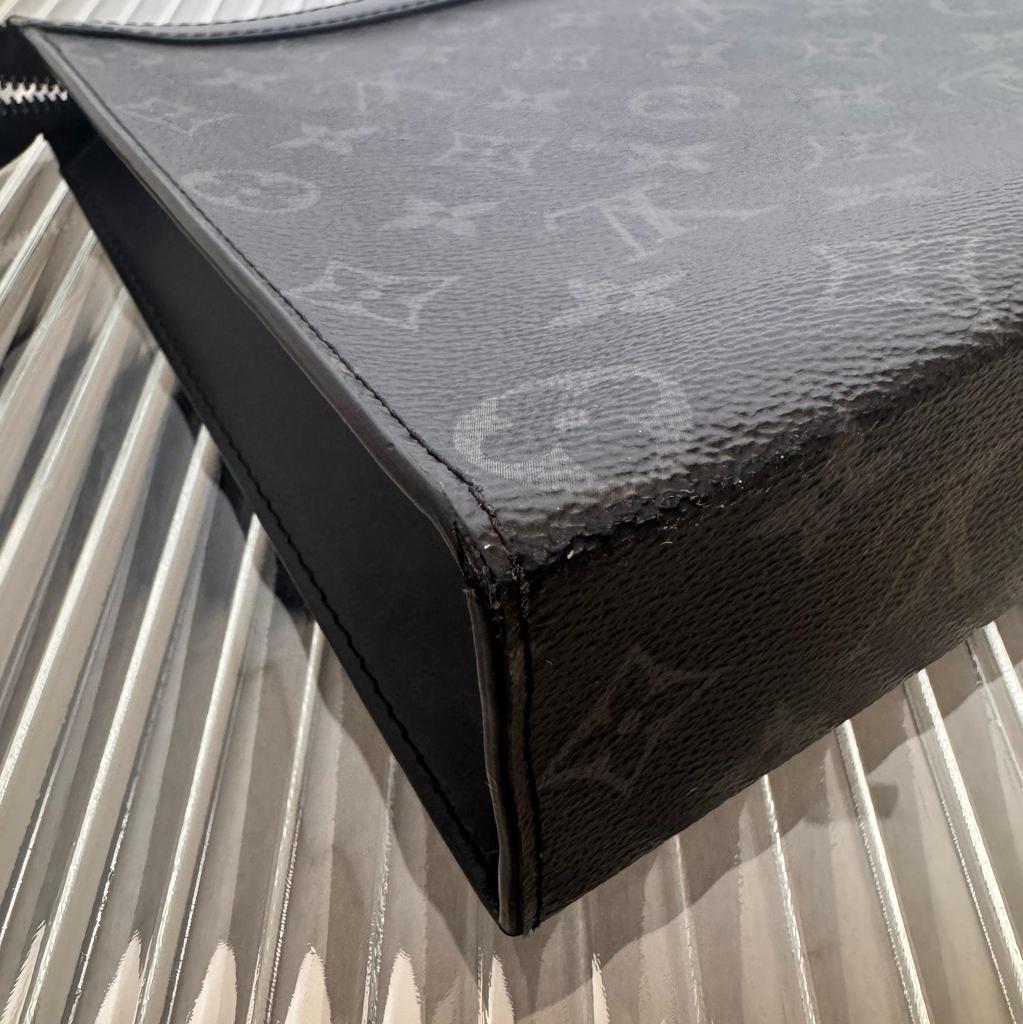 [Б/У] Louis Vuitton Pochette Voyage MM 'Черный холст Monogram Eclipse' - Очень хорошее состояние #1DX6VJ6