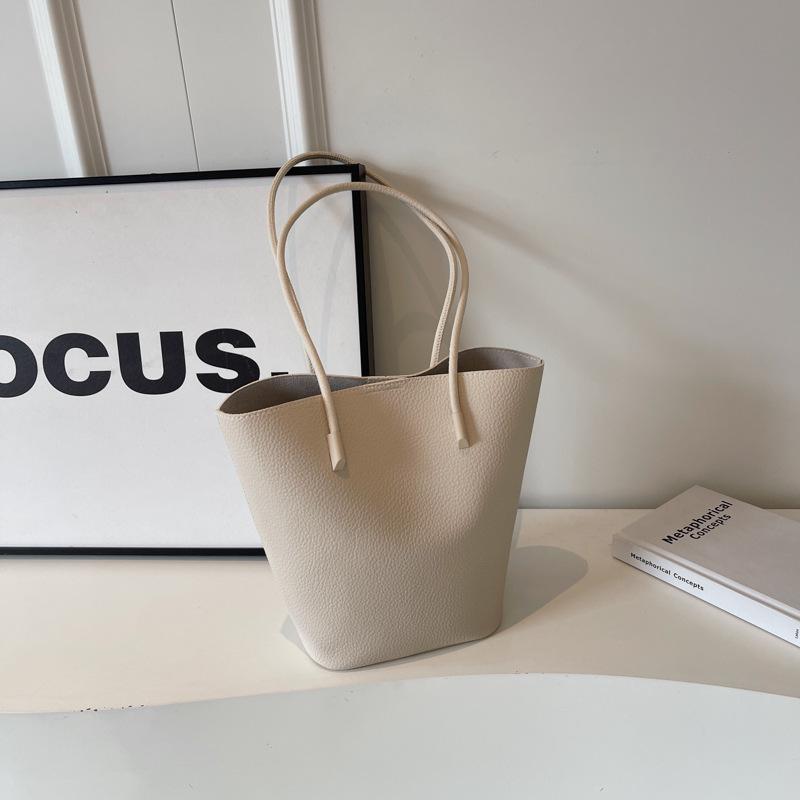 Ретро мода большая вместимость сумка женская 2025 новая осень и зима сумка-тоут для通勤 нишевая повседневная универсальная сумка через плечо