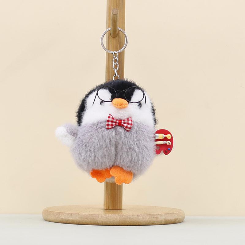 Little Plush Penguin Keychain With Glasses Designed With A Checkered Bow Tie