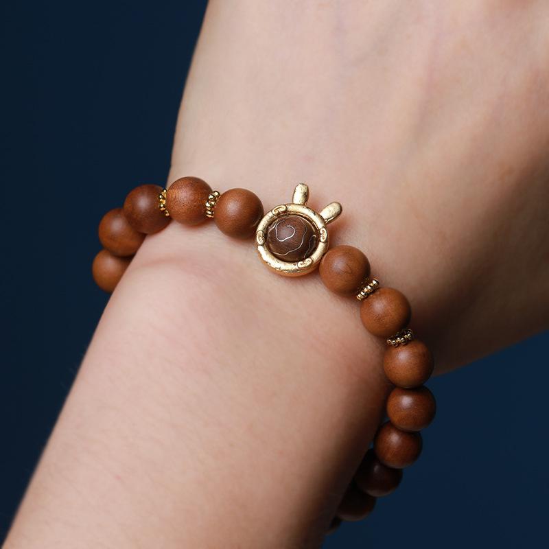 Gold-swallowing beast, old mountain sandalwood inlaid with silver auspicious cloud bracelet, natural jade female rabbit year natal year bracelet