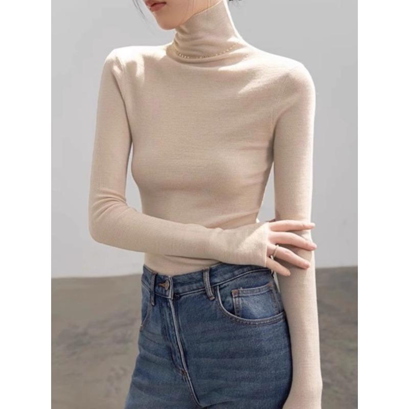 A spring, autumn and winter heap-neck knitted sweater, a new slim-fitting and thin temperament turtleneck bottoming shirt