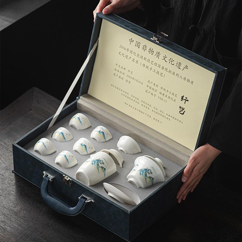 Suet jade white porcelain kung fu tea set, a complete set of gift boxes, office tea tasting cup cover bowl business souvenir
