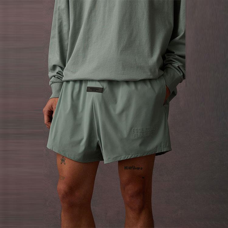 Fear of God Essentials Беговые нейлоновые шорты Платан Мужские Низ Зеленый 160BT224041F