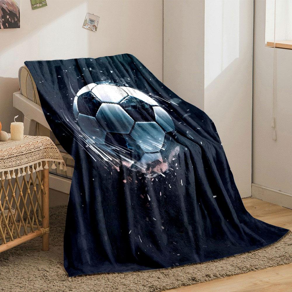 A soccer ball shattering dramatically with flying fragments and motion blur. for all seasons blanket lunch break throw gift