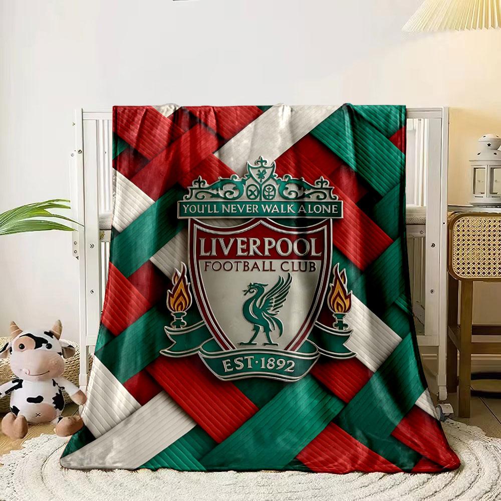 Woven red, green, and white textured pattern with a central crest. for all seasons blanket lunch break throw gift