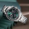 Seiko Часы с кварцевым механизмом, водозащитой 100 м, стальным ремешком, унисекс, зеленым циферблатом SSC933P1