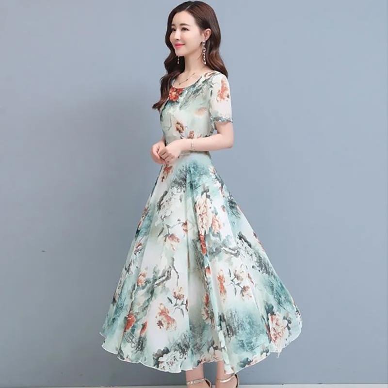 New Elegant Floral Fashion Dress Women's Summer Fashion Cover Belly Slim Long Flowing Dress Beach Skirt.