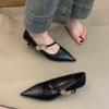2025 new pointed temperament metal buckle one-word strap high heels light mouth low heel French commuter black single shoes women
