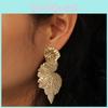 Metal Leaf Earrings With Gold Coating And Bold Design For Holidays And Celebrations