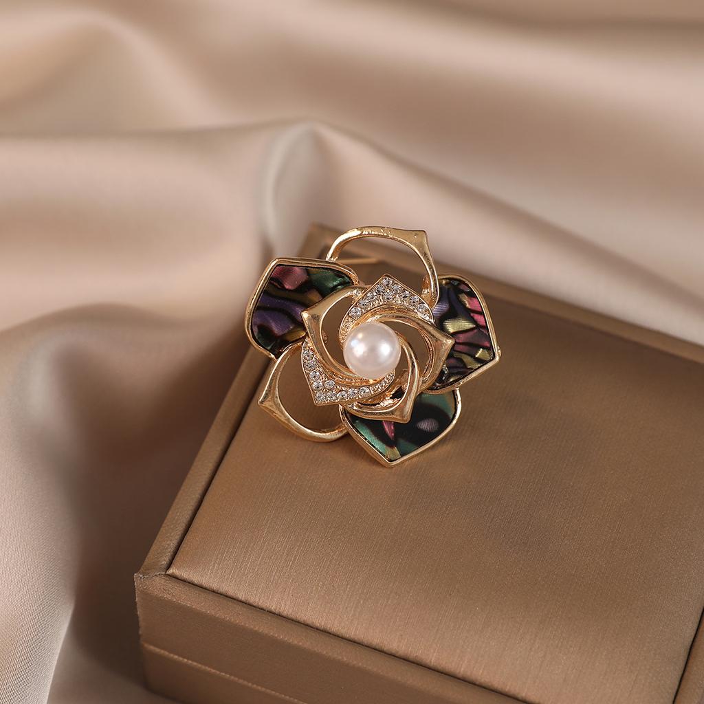 A Delicate Pearl Garland Brooch with A Little Design Elegant and Fashionable for Women and A Sweet New Camellia Corch