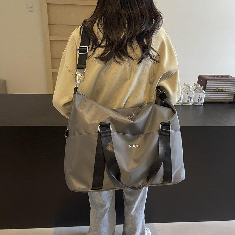 Большая вместительная сумка 2024 года, новая повседневная ручная деловая дорожная сумка, женская универсальная сумка через плечо для путешествий на короткие расстояния