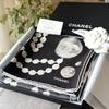Used CHANEL Pearl Chain COCO MARK Scarf Fall/Winter 2025-26