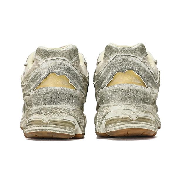 New Balance 2002R Protection Pack — рваные кроссовки унисекс Белый Морская Соль Винтаж-Оранжевый M2002RDG