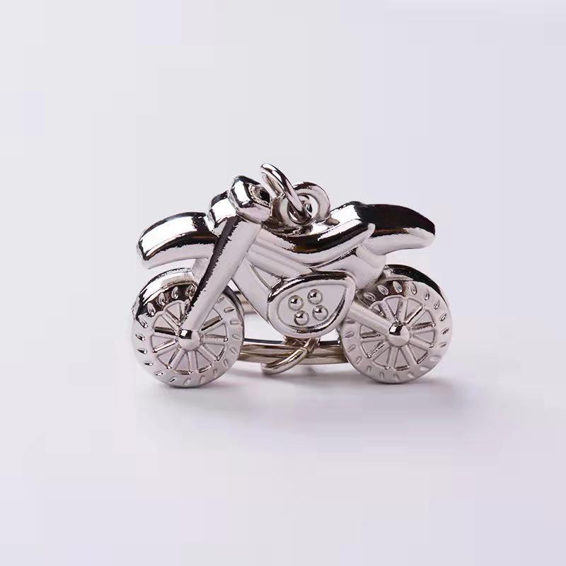 Металлический брелок для ключей в виде мотоцикла с лазерным логотипом - уникальный рекламный подарок или небольшой жетон.