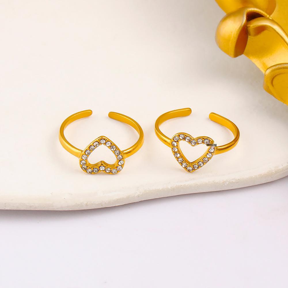 Гонконгская мода Позолоченное 18K титановое кольцо-сердце со стразами и цирконием