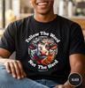 Follow The Word Not The Herd Cow Graphic T-shirt | Christian Scripture Design