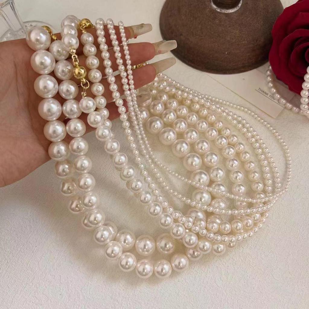 Elegant Magnetic Pearl Clavicle Necklace – High-End Versatile Sweater Chain for Women