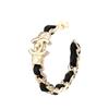 Chanel Кожаные серьги с металлической инкрустацией для женщин