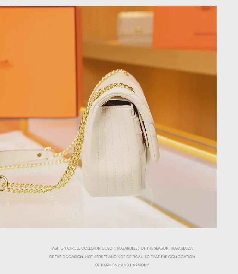 Женская сумка через плечо из натуральной кожи с замком-четырехлистником и цепочкой с бриллиантами