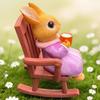 Rocking Chair Rabbit Figurine Holding Cup Cartoon Sitting Bunny Resin Statue Animal Sculpture Indoor