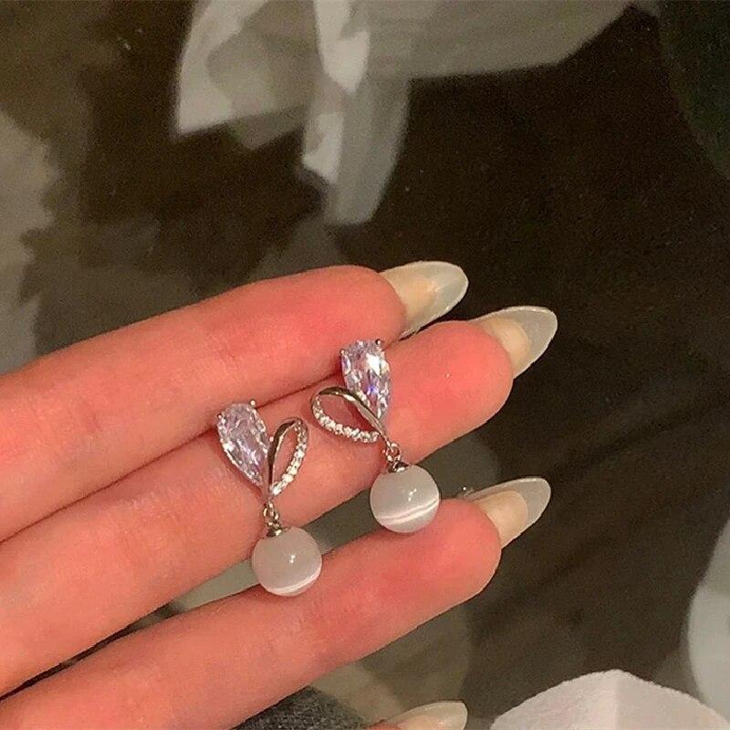 1 пара роскошных серег с опалом, имитацией жемчуга, стеклянными бриллиантами, из сплава с золотым покрытием, с прохладным ветром