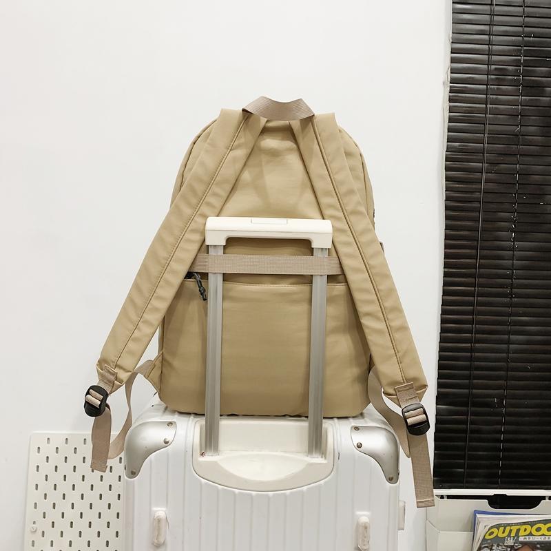 Рюкзак однотонный мужской нейлоновый водонепроницаемый большой емкости легкий дорожный рюкзак для школьников