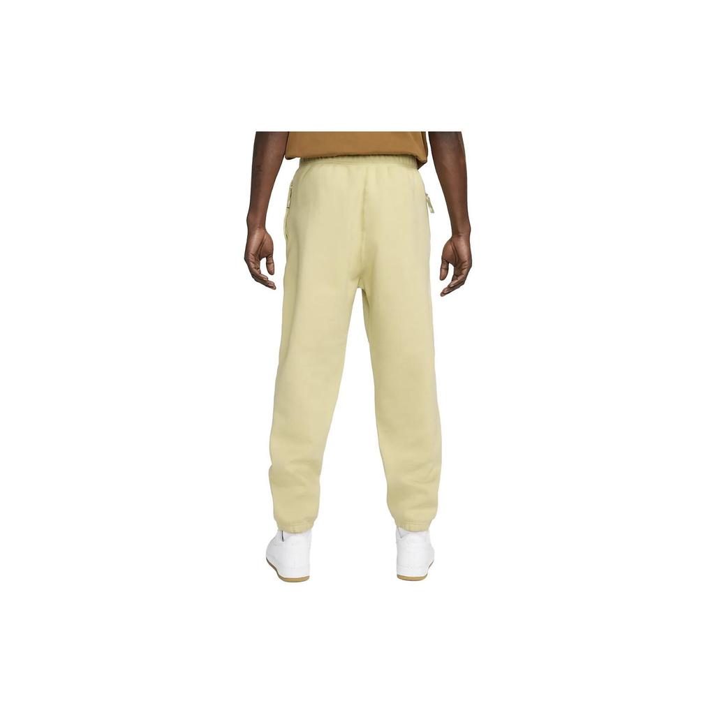 Nike Флисовые брюки Solo Swoosh Team Gold/White для мужчин в уличном стиле DX1364-783