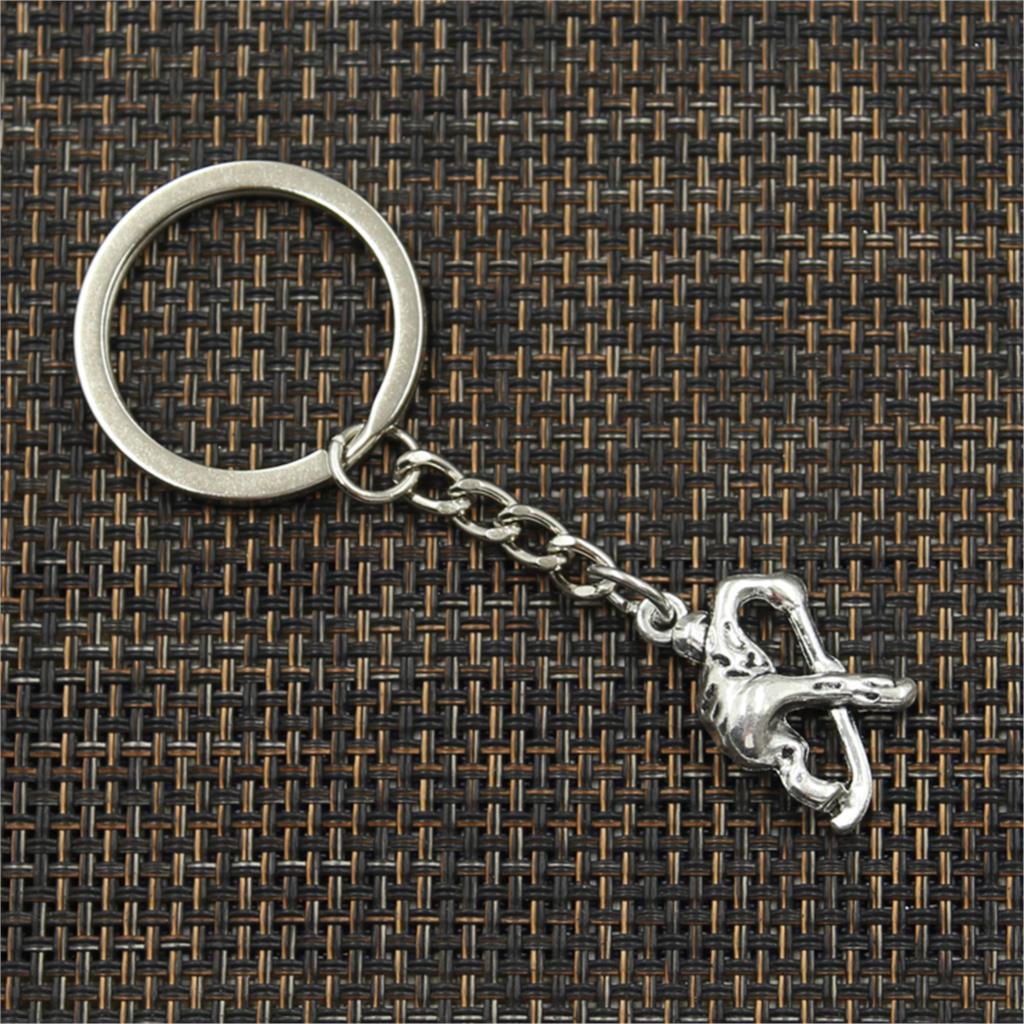 Fashion Keychain 25x16mm Hockey Player Sporter Bronze Silver Color Pendants DIY Men Jewelry Car Key Chain Ring Holder Gift